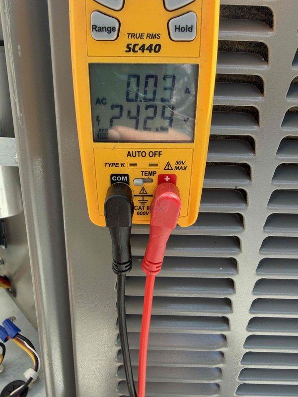 Completed routine HVAC maintenance and system diagnostics. Performed electrical measurements using digital multimeter, recording voltage and amperage readings to verify proper system operation and electrical component performance. Unit operating within normal parameters. All diagnostic photos documented for service records.