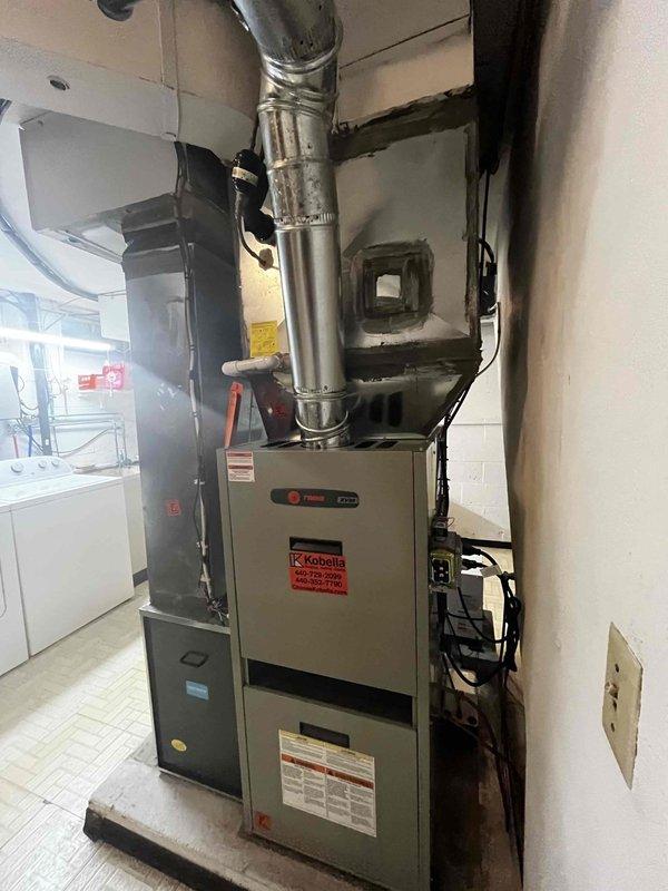 Completed routine cooling maintenance for club member. Performed comprehensive system inspection of Trane furnace and air handler unit. Verified electrical readings using multimeter, recording 288.2 volts to confirm proper power supply to equipment. Inspected all major components including ductwork, control panel, and wiring connections. System operating within normal parameters with no issues identified during maintenance visit.