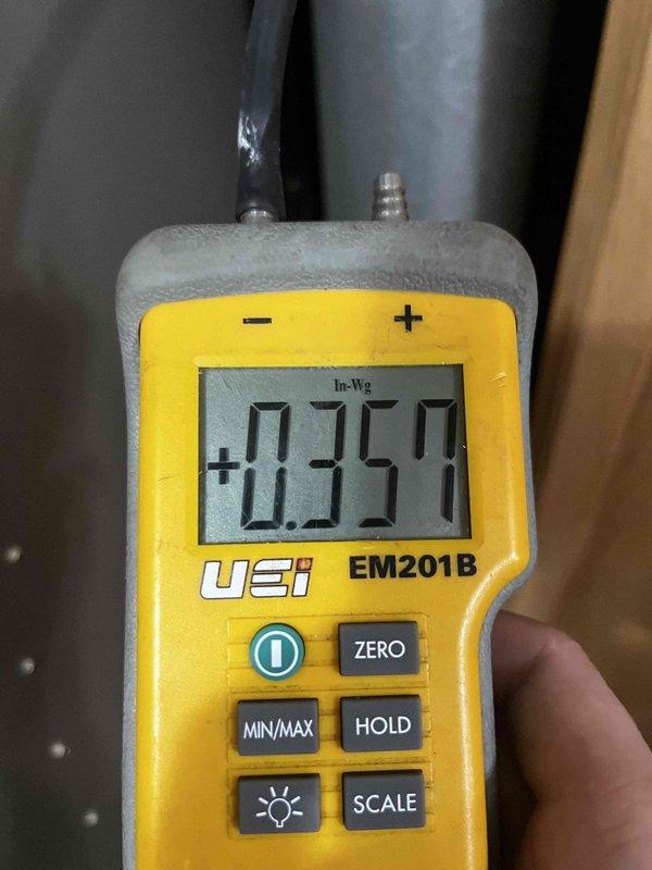 Completed routine cooling maintenance member visit on air handler system. Performed standard system diagnostics including static pressure measurements using differential pressure gauge, recording 0.350 inches of water gauge, and temperature verification reading 75.1°F. All measurements within normal operating parameters for continued system performance.