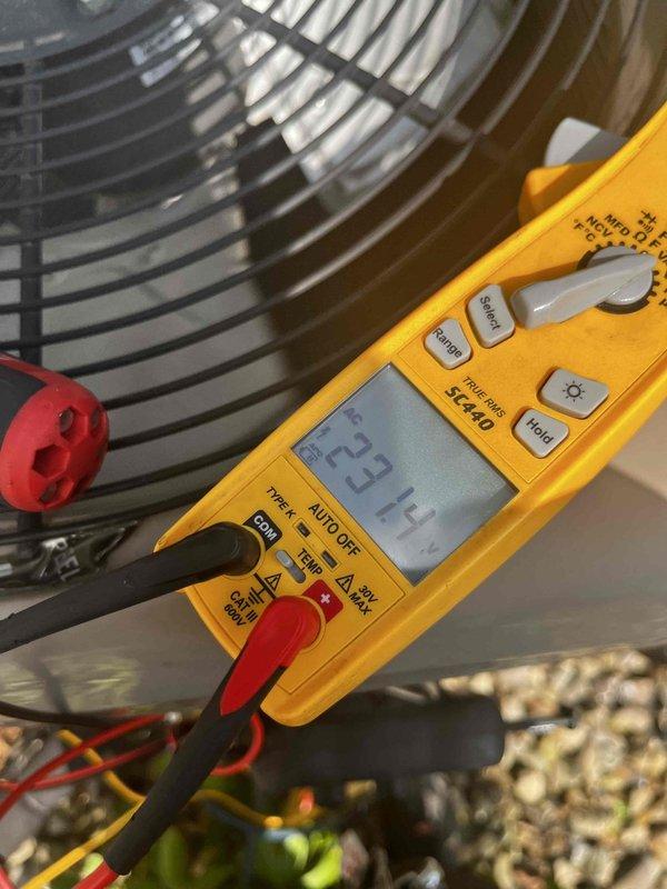Completed cooling maintenance member visit on HVAC system. Installed customer-provided air filter, performed electrical diagnostics using multimeter to verify system amperage at 23.14 amps, and inspected condenser fan motor and blower assembly to ensure proper operation.