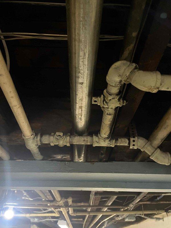 Returned to property to complete previously sold repair work for leaking valve replacement. Successfully replaced the defective valve in the basement plumbing system and addressed associated water damage in the surrounding area. The repair involved accessing aging piping infrastructure, including insulated supply lines showing wear from environmental exposure. Completed valve installation with proper sealing and tested system for leaks to ensure full functionality. Restored affected area to proper working condition.