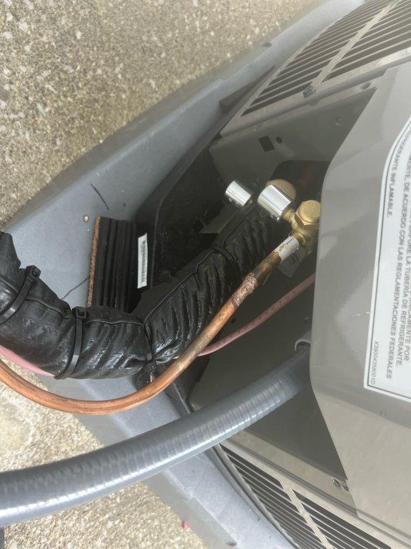 Completed full HVAC system installation including outdoor condensing unit with refrigerant line connections and proper leveling of equipment on mounting pad. Verified all copper refrigerant lines were properly connected to brass fittings, ensured unit was level using precision tools, and confirmed system was ready for startup. Payment collected in full upon completion.