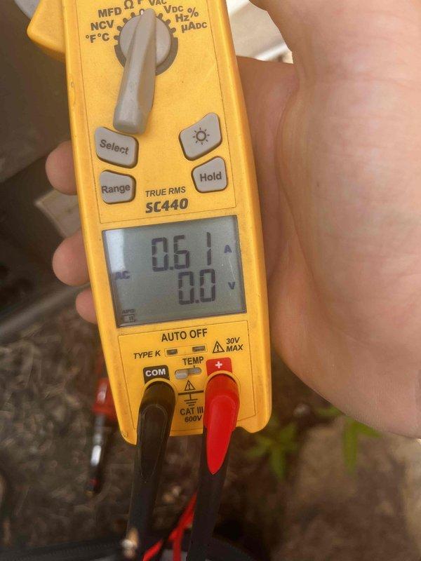 Completed comprehensive AC tune-up and maintenance on 9-year-old cooling system. Performed electrical diagnostics using clamp meter, measuring current draw of 0.61A and verifying proper voltage readings to ensure compressor and system components operating within manufacturer specifications. Conducted standard clean and check procedures including inspection of ductwork, testing of electrical connections, and verification of system performance to maintain optimal cooling efficiency.