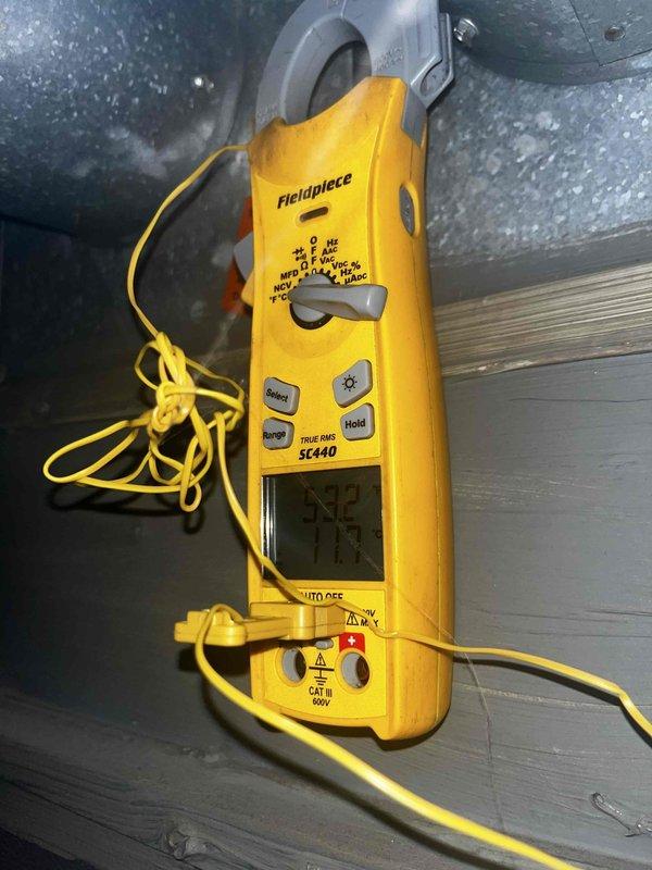 Completed comprehensive AC tune-up and maintenance on 9-year-old cooling system. Performed electrical diagnostics using clamp meter, measuring current draw of 0.61A and verifying proper voltage readings to ensure compressor and system components operating within manufacturer specifications. Conducted standard clean and check procedures including inspection of ductwork, testing of electrical connections, and verification of system performance to maintain optimal cooling efficiency.