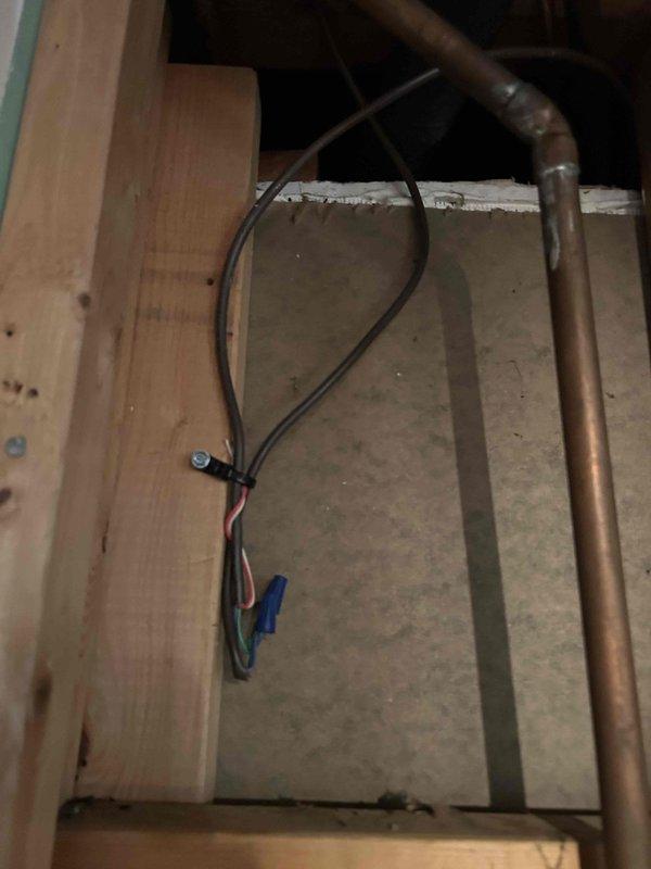 Responded to no cooling complaint on Comfort Air brand unit installed one year prior by another contractor. Upon arrival, found system had been serviced three times previously without resolution. Performed diagnostic evaluation and confirmed compressor failure as suspected. Identified improper electrical connections in attic installation with exposed wiring and inadequate terminations at unit location. Documented installation deficiencies including substandard wire management and potential safety hazards in electrical rough-in. Advised customer of compressor replacement requirements and necessary correction of electrical installation issues to bring system up to code and manufacturer specifications.