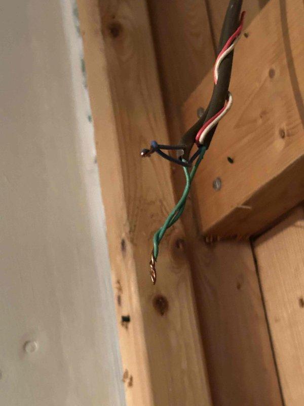 Responded to no cooling complaint on Comfort Air brand unit installed one year prior by another contractor. Upon arrival, found system had been serviced three times previously without resolution. Performed diagnostic evaluation and confirmed compressor failure as suspected. Identified improper electrical connections in attic installation with exposed wiring and inadequate terminations at unit location. Documented installation deficiencies including substandard wire management and potential safety hazards in electrical rough-in. Advised customer of compressor replacement requirements and necessary correction of electrical installation issues to bring system up to code and manufacturer specifications.