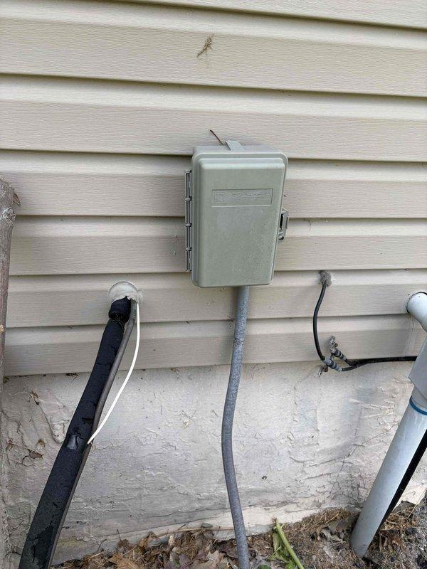 Conducted on-site evaluation for whole-house air conditioning system replacement. Assessed existing outdoor condensing unit of unknown age and indoor furnace system with connected ductwork. Documented current equipment configuration, electrical connections, refrigerant line routing, and overall system condition to provide comprehensive replacement recommendations.