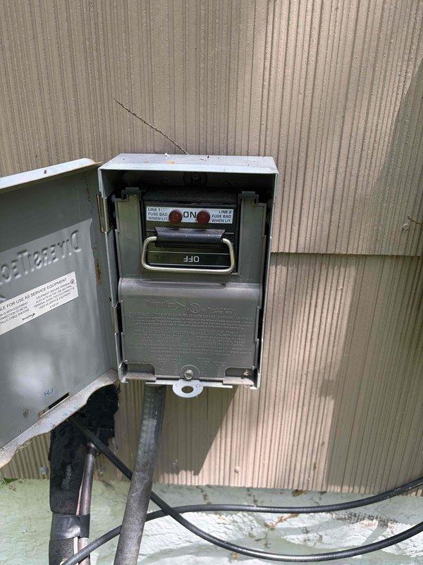 Responded to no cooling complaint on 6-year-old residential air conditioning system. Upon arrival, confirmed unit was running but delivering warm air with no temperature reduction. Performed diagnostic testing using digital multimeter to measure electrical values and system parameters, reading 932 on initial assessment. Inspected outdoor disconnect switch and verified proper electrical supply to condensing unit. Identified system malfunction preventing proper cooling operation and addressed the issue to restore normal function.