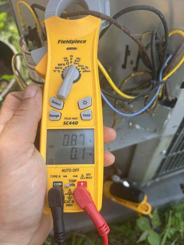 Responded to no cooling complaint on residential air conditioning system. Upon arrival, performed diagnostic testing of electrical components using digital multimeter at both indoor air handler and outdoor condensing unit. Measured voltage, amperage, and capacitance readings to assess system performance and identify root cause of insufficient cooling. System evaluated and measurements documented for proper operation of HVAC equipment.