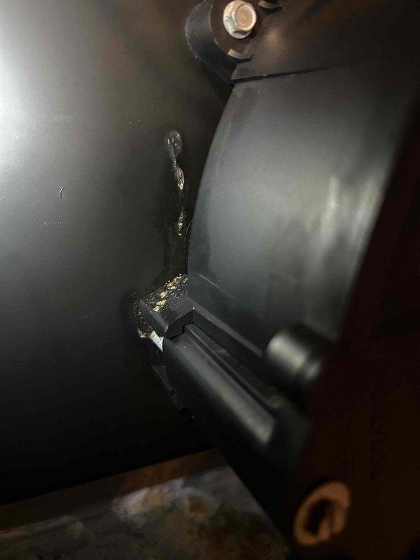 Responded to no heat call on furnace blowing cold air. Upon inspection, found system equipped with old-style mechanical thermostat. Performed diagnostic evaluation of heating system, inspecting blower motor assembly, ductwork connections, and internal components for proper operation. Addressed airflow concerns and verified all mechanical connections within the cabinet were secure. System showed normal wear with dust and debris accumulation on base platform, which is typical for operational equipment. Confirmed all safety labels and warning indicators were visible and intact per code requirements.