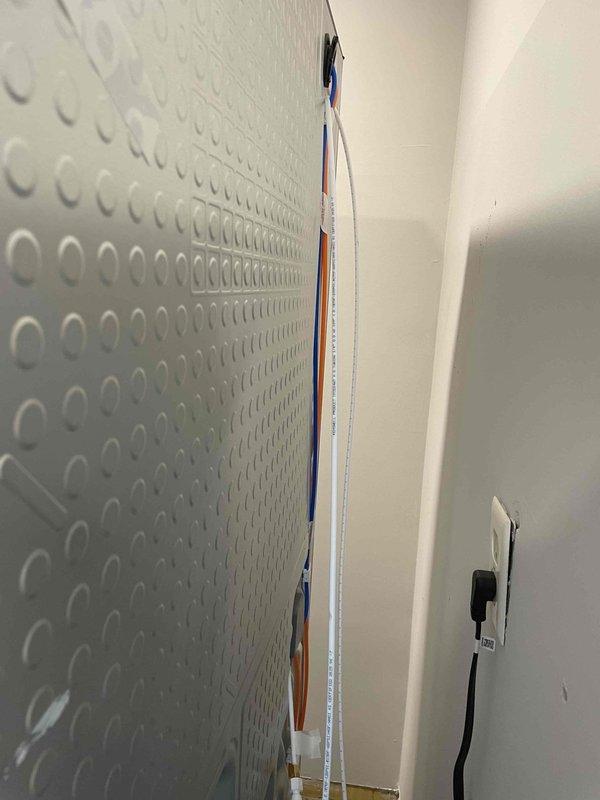 Installed refrigerator line valve to supply water connection for appliance. Valve was properly secured and tested for leaks to ensure reliable water flow to the refrigerator ice maker and water dispenser system.