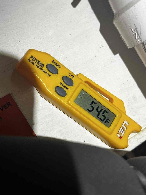 Responded to service call for non-operational air conditioning unit with water discharge issue. Upon inspection, discovered condensate drain blockage causing water overflow from the system. Cleared drain line obstruction, verified proper drainage flow, and tested unit operation with supply air temperature reading of 54.5°F, confirming system returned to normal cooling function.