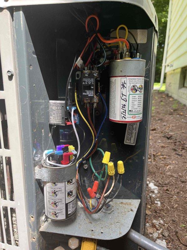 Completed routine cooling maintenance member visit on outdoor HVAC unit. Performed comprehensive inspection of electrical compartment, including capacitors, contactor, wiring connections, and all associated components. All electrical connections were verified secure, capacitors tested within normal operating parameters, and system found to be in proper working condition with normal wear patterns for age of equipment.
