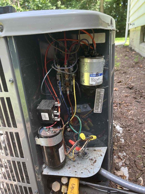 Completed routine cooling maintenance member visit on outdoor HVAC unit. Performed comprehensive inspection of electrical compartment, including capacitors, contactor, wiring connections, and all associated components. All electrical connections were verified secure, capacitors tested within normal operating parameters, and system found to be in proper working condition with normal wear patterns for age of equipment.