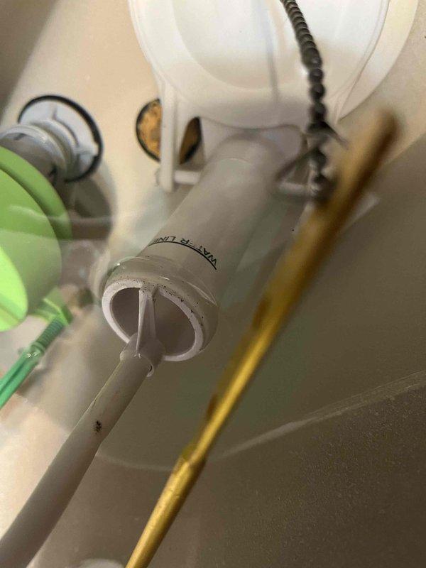 Completed plumbing membership visit and performed comprehensive inspection of bathroom fixtures. Tested faucet operation and water flow at bathroom sink, verified proper drainage function, and inspected under-toilet plumbing components including supply line connections, PVC piping, and check valve assembly to ensure all systems were functioning properly with no leaks detected.