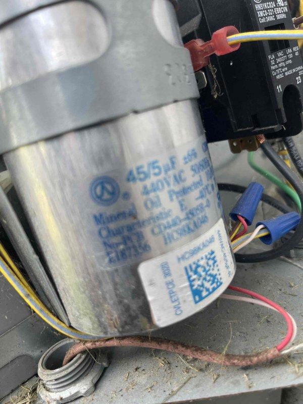Completed HVAC club membership renewal maintenance visit on air handler unit. Performed system inspection and temperature verification, recording 71.9°F at equipment surface. Inspected electrical components including dual-run capacitor rated at 45/5 MFD 440V, confirmed proper wire connections and mounting hardware secure. All components operating within normal parameters.