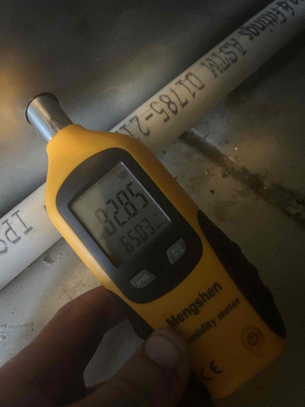 Completed full HVAC system installation with all equipment operational and verified. Conducted temperature and humidity measurements throughout the system, confirming proper airflow and refrigerant performance with supply air temperature reading 61.9°F and ambient conditions at 52.2°F with 28.5% humidity. All PVC condensate drainage lines installed to manufacturer specifications with proper pitch and support, ensuring reliable moisture removal from the system.