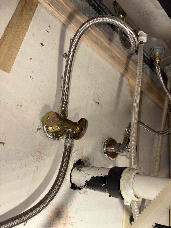 Completed comprehensive inspection and evaluation of emergency shut-off valves and fixture stops throughout the property. Assessed main pre-meter shut-off valve, second floor bathroom fixtures, laundry sink connections, sump pump installation, and main floor bathroom plumbing components. Documented existing conditions of supply lines, drain assemblies, and fixture connections showing normal wear patterns and mineral buildup. All emergency stop locations identified and verified for accessibility and future service requirements.