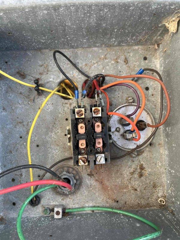 Responded to no cooling call and performed system diagnostics. Inspected outdoor unit contactor assembly and found faulty contactor preventing compressor operation. Also evaluated indoor air handler control board for proper operation and verified all electrical connections and safety circuits. Customer will be proceeding through home warranty company for authorization on necessary repairs.