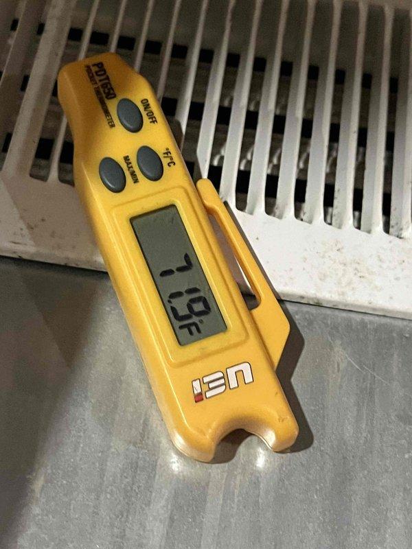 Responded to emergency no-cool call on thirteen-year-old air conditioning system. Performed diagnostic testing using digital meters to assess system performance, measuring electrical parameters at the outdoor condenser unit and verifying supply air temperature at 69°F. Identified system malfunction preventing proper cooling operation and documented equipment conditions with diagnostic readings for customer records.