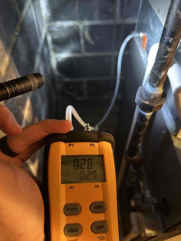 Responded to no airflow complaint on upstairs zone of new dual-zone system. Inspected air handler and evaporator coil assembly, verified downstairs zone operating normally. Measured static pressure readings of 0.28-0.29 inches water column at equipment. Diagnosed issue as incorrect fan speed settings on zone control system. Adjusted damper and fan configuration settings to restore proper airflow to upstairs zone, confirmed system operating correctly both zones upon departure.