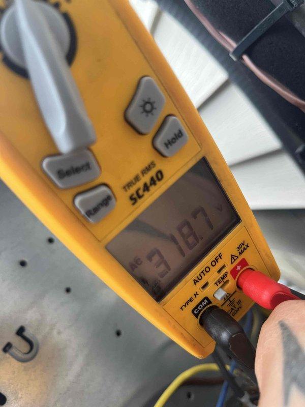 Completed routine maintenance on a 4-year-old air conditioning system per club membership agreement. Performed comprehensive AC tune-up including electrical testing with digital multimeter to verify proper voltage and amperage readings across system components. Inspected and cleared condensate drain line, confirming proper drainage and no blockages. System operating within manufacturer specifications with no deficiencies noted. Also inspected heating components of air handler as requested; all components found in satisfactory condition.