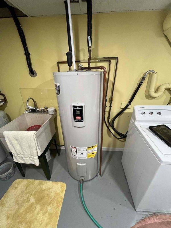 Responded to service call for 50-gallon electric water heater with leaking pressure relief valve (PRV). Upon inspection, confirmed PRV leak at top connections and identified corroded anode rod requiring replacement. Replaced faulty pressure relief valve with new unit, installed new anode rod to prevent further tank corrosion, and tested all connections for proper operation and seal integrity. Verified hot water system functionality and confirmed no additional leaks present at copper piping connections or tank fittings.
