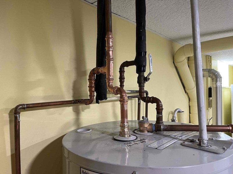 Responded to service call for 50-gallon electric water heater with leaking pressure relief valve (PRV). Upon inspection, confirmed PRV leak at top connections and identified corroded anode rod requiring replacement. Replaced faulty pressure relief valve with new unit, installed new anode rod to prevent further tank corrosion, and tested all connections for proper operation and seal integrity. Verified hot water system functionality and confirmed no additional leaks present at copper piping connections or tank fittings.