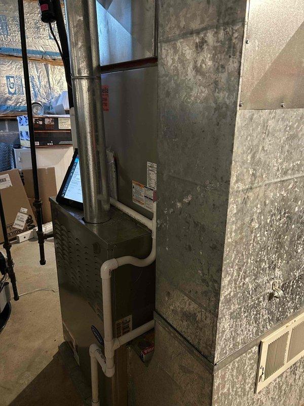 Responded to service call for grinding noise from blower motor while system continued to operate. Upon inspection, identified worn motor bearings causing the abnormal sound in the air handler unit. Lubricated motor bearings and verified proper motor operation, eliminating the grinding noise while maintaining normal cooling function.