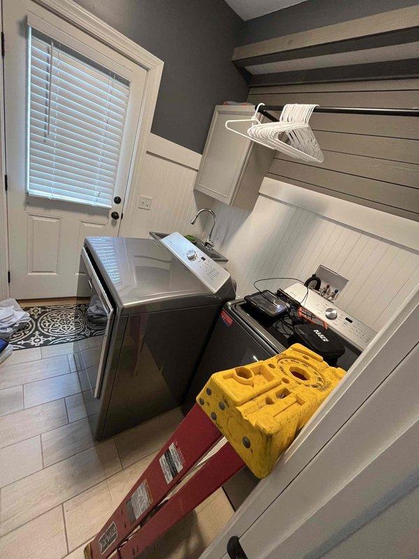 Responded to service call for odor complaint in laundry room sink and drainage issues in master bedroom sink. Removed access panel beneath master bathroom vanity to inspect P-trap assembly and drainage connections. Diagnosed plumbing system using diagnostic equipment to identify source of problems. Addressed drainage concerns in both locations, ensuring proper trap configuration and ventilation to eliminate odors and restore proper function.