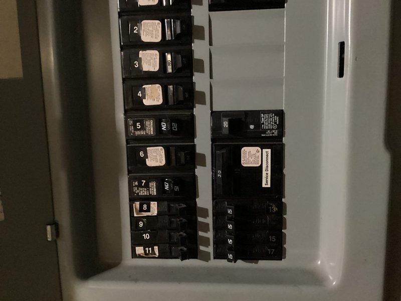 Conducted site assessment for HVAC system replacement and prepared two separate equipment replacement quotes as requested. Inspected existing air conditioning unit and complete heating and cooling system, including air handler and ductwork located in attic space. Documented electrical service panel configuration showing existing HVAC circuit breaker setup and evaluated current system's aged ductwork condition, noting visible oxidation and wear on metal components. Provided comprehensive replacement options for air conditioning unit only as well as complete system changeout to allow for comparison shopping.