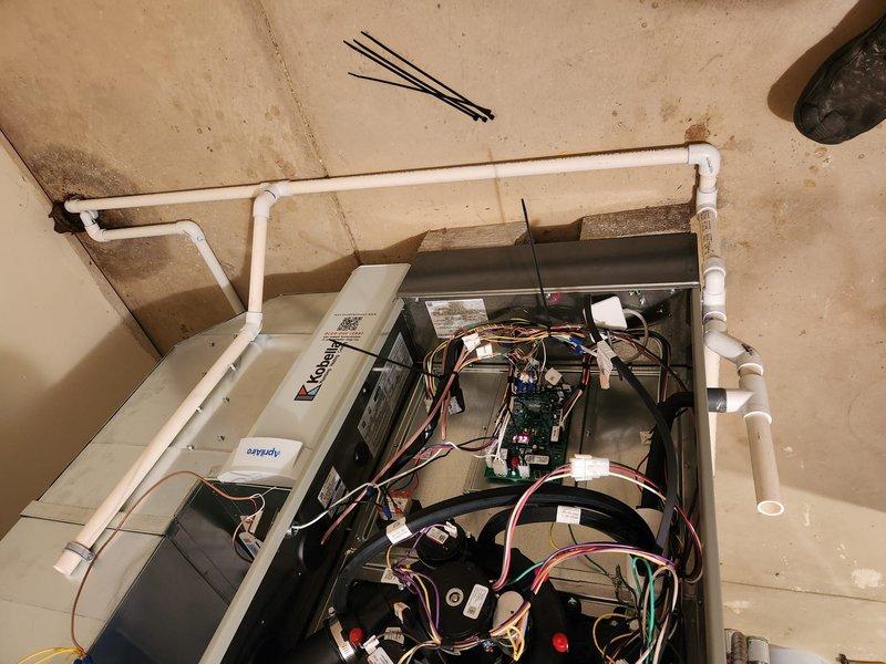 Completed full HVAC system installation with new equipment and control panel. Installed and wired control board with proper electrical connections, ensuring all safety protocols were followed. Mounted new control panel in utility space with PVC condensate drain lines properly routed and secured. Performed combustion analysis testing using calibrated equipment, verifying carbon monoxide levels and combustion efficiency readings within manufacturer specifications. System commissioned and tested for proper operation.