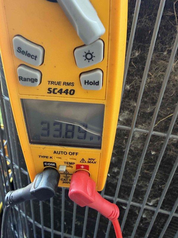 Completed annual preventative maintenance on a five-year-old air conditioning system with no reported issues. Performed comprehensive AC tune-up including system diagnostics, electrical measurements using digital multimeter to verify voltage and amperage readings at outdoor condenser unit, and visual inspection of heat exchanger coils. All measurements within normal operating parameters and system functioning properly.