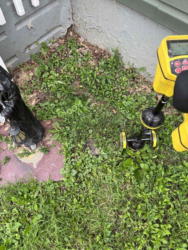 Performed main line drain cleaning service as a follow-up to previously sold work. Used electronic locating equipment to identify the main sewer line position in the exterior ground area, then proceeded to snake and hydro-jet the line to clear blockages and restore proper drainage flow.