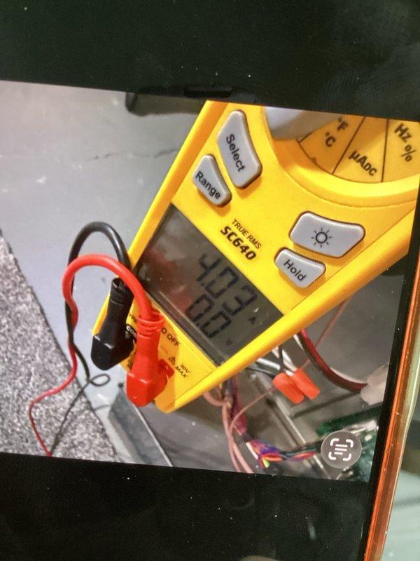 Completed cooling maintenance club visit on air handler unit. Performed electrical diagnostics using clamp meter to verify system operation and measure amperage draw. Inspected blower compartment, capacitor, and relay components. All electrical connections found secure with proper wire routing. Unit operating within normal parameters.