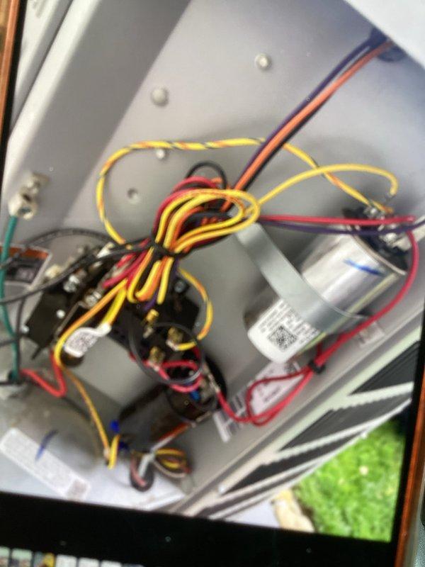 Completed cooling maintenance club visit on air handler unit. Performed electrical diagnostics using clamp meter to verify system operation and measure amperage draw. Inspected blower compartment, capacitor, and relay components. All electrical connections found secure with proper wire routing. Unit operating within normal parameters.