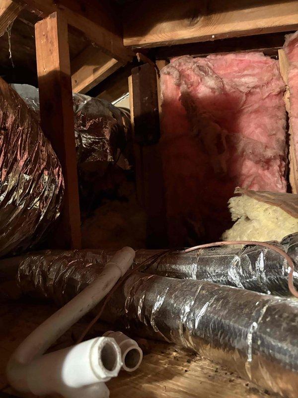 Responded to service call for air conditioning system running constantly with suspected low refrigerant levels. Accessed attic space to evaluate existing HVAC system and ductwork configuration. After assessment, provided comprehensive estimate for complete air conditioning system replacement, including new air handler unit to address aging R22 refrigerant system and continuous runtime issues.