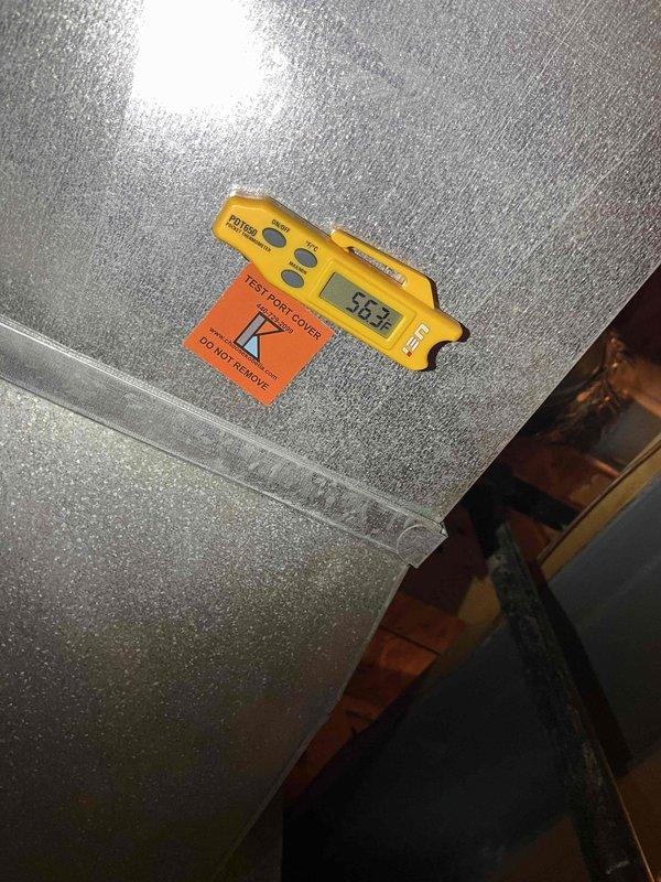 Completed warranty condenser fan motor replacement on outdoor unit and installed dual surge protection package. Performed furnace airflow upgrades to improve system efficiency and verified proper operation of all components with temperature readings confirming system performance at 58.4°F.