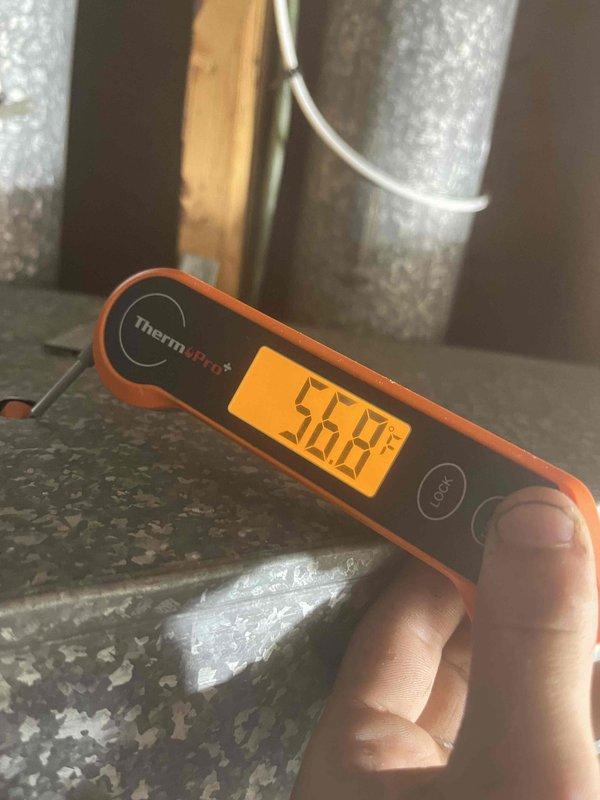 Completed air conditioning installation following previous sale. Verified system operation by measuring supply air temperature at 56°F through ductwork, confirming proper cooling performance. Replaced two TR15R time-delay fuses as part of electrical circuit protection during installation process. System tested and operational.
