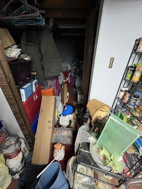 Responded to emergency call for plugged drain in 70-year-old residential property. Accessed plumbing system through storage area to diagnose and clear blockage. Successfully restored proper drainage function and confirmed system operation before departure.