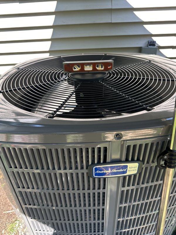 Completed full HVAC system installation including American Standard Silver 13 outdoor condensing unit with proper electrical disconnect and TR25R fuse protection. Installation coordinated with general contractor's schedule, system tested and operational upon completion.
