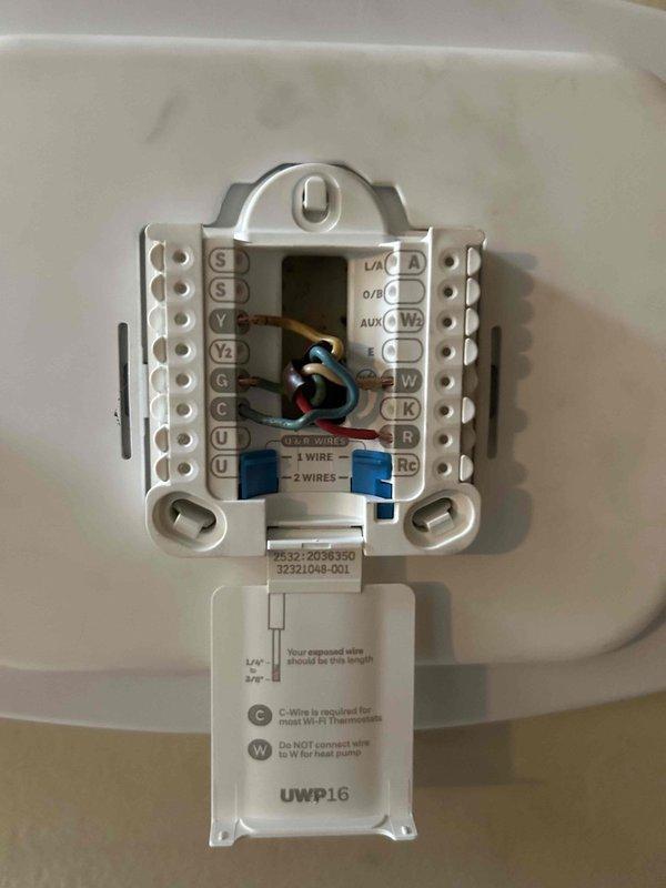 Completed warranty repair on HVAC system involving thermostat and control board replacement. Removed existing thermostat, verified proper wire terminations at both the wall unit and furnace control board, and installed new UWP16 thermostat with updated wiring configuration per manufacturer specifications.