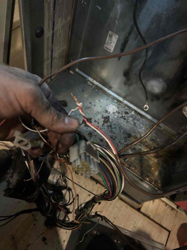 Completed warranty repair on HVAC system involving thermostat and control board replacement. Removed existing thermostat, verified proper wire terminations at both the wall unit and furnace control board, and installed new UWP16 thermostat with updated wiring configuration per manufacturer specifications.