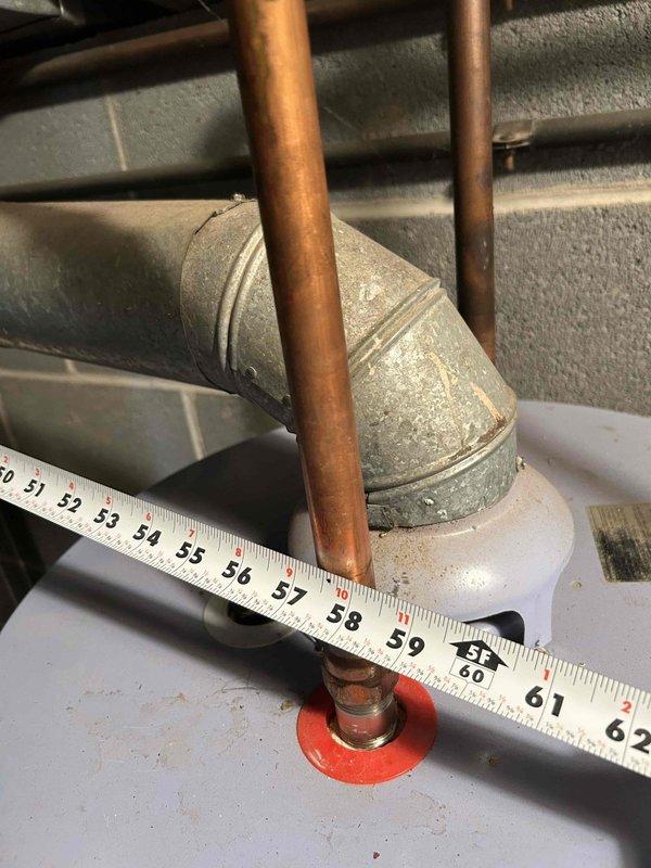 Responded to service call for tanked water heater with pilot light ignition failure in basement installation. Upon inspection, diagnosed pilot light assembly malfunction preventing burner ignition. Completed necessary repairs to restore proper pilot light operation and verified full functionality of water heater system. Unit returned to normal operating condition with all safety controls functioning as designed.