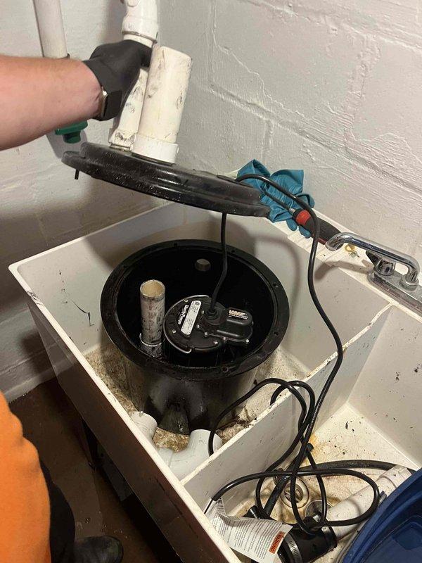Responded to service call for sump pump with sticking float mechanism. Upon inspection, confirmed float was binding and preventing proper pump activation. Performed maintenance on float assembly and tested system operation to ensure proper cycling and water level control.