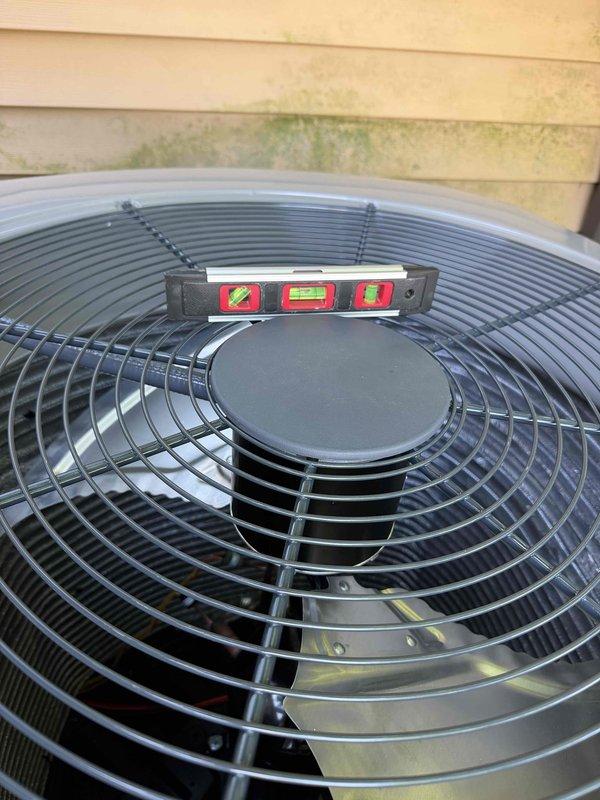 Completed full HVAC system installation including outdoor condensing unit and electrical disconnect box. Verified proper leveling of all equipment using precision level tools, ensuring optimal system performance and longevity. All electrical connections secured to code specifications with proper wire terminations and disconnect switch in accessible location on exterior wall.