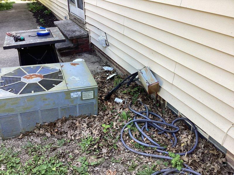 Conducted estimate for complete HVAC system replacement at residential property. Assessed existing exterior condensing unit showing significant age-related deterioration, including rust staining, metal casing discoloration, and weathering from environmental exposure. Evaluated electrical panel configuration and circuit breaker arrangement to determine compatibility requirements for new equipment installation. Documented current system condition and electrical infrastructure to provide comprehensive replacement quotation for upgraded air conditioning system suitable for condominium unit application.