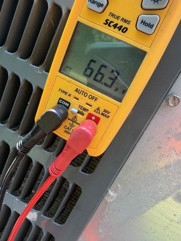 Completed annual AC maintenance tune-up on 8-year-old outdoor unit as part of yearly club membership service. Performed comprehensive system inspection, recorded temperature differential reading of 66.3°F and measured system amperage at 48.35A, confirming unit is operating within normal parameters with no issues found.