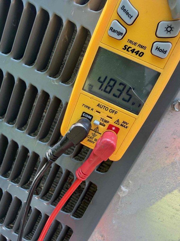 Completed annual AC maintenance tune-up on 8-year-old outdoor unit as part of yearly club membership service. Performed comprehensive system inspection, recorded temperature differential reading of 66.3°F and measured system amperage at 48.35A, confirming unit is operating within normal parameters with no issues found.