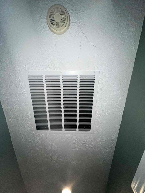 Completed scheduled cooling maintenance for club member. Performed comprehensive system inspection including verification of air flow through return vents and ceiling-mounted ventilation components. Documented equipment condition with photographic records showing proper installation and operation of HVAC registers and diffusers throughout the serviced areas.